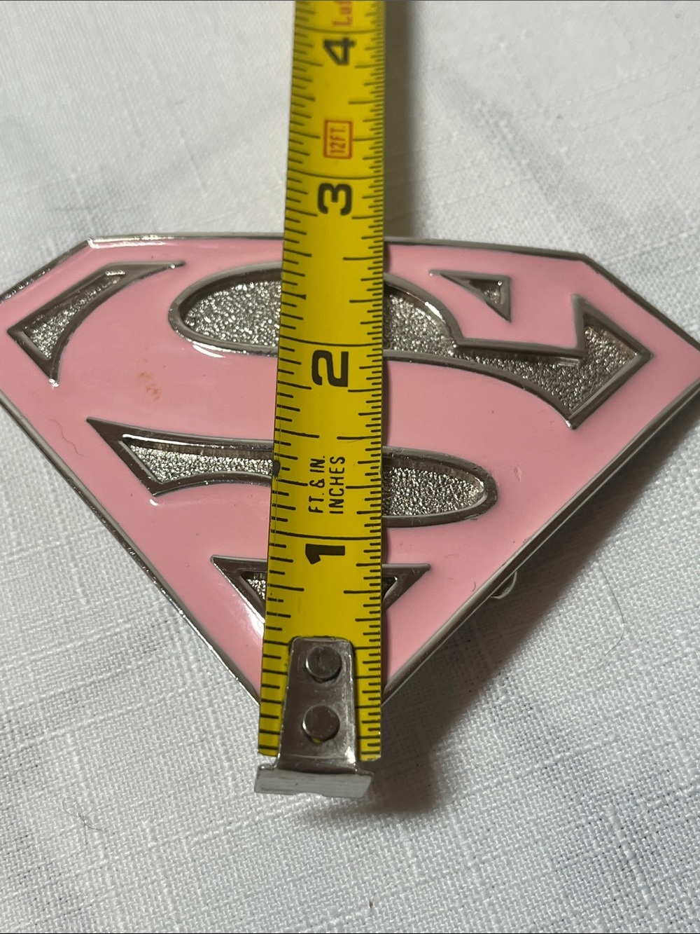 DC Comics Supergirl logo belt buckle
pink enamel
metallic base 
Supergirl 'S’ - Picture 4 of 5